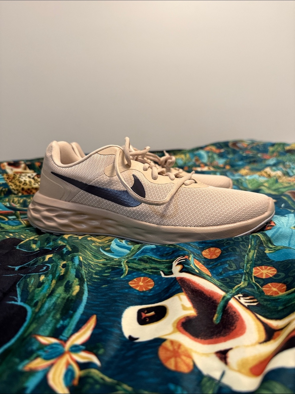 Nike Beige Athletic Sneakers with Black Swoosh